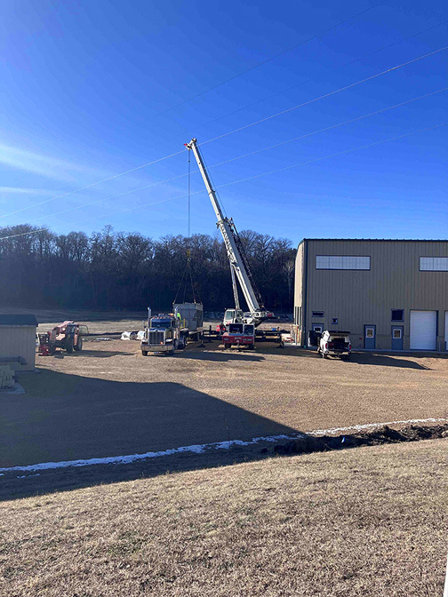 biosolid hopper being moved